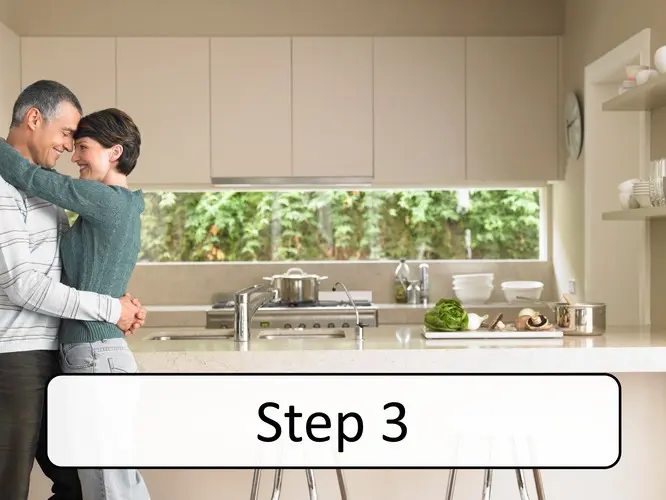 Brisbane Benchtops - Step 3 - Couple loving their gorgeous stone benchtop in Ashgrove